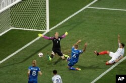 Iceland's Ragnar Sigurdsson scores during the Euro 2016 round of 16 soccer match between England and Iceland, at the Allianz Riviera stadium in Nice, France on June 27, 2016.
