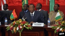 The president of Burkina Faso, Blaise Compaore, speaks during ECOWAS talks on Mali on July 7, 2012, in Ouagadougou. 