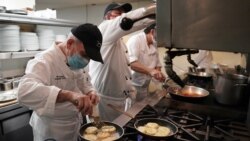 Executive Chef Vito Gnazzo of Il Gattopardo restaurant prepares a smoked mozzarella appetizer.