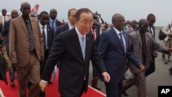 UN Secretary-General Ban Ki-moon, center, walks surrounded by Burundian Security personnel as he arrives in Bujumbura, Burundi, Monday, Feb.22, 2016.