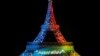 La tour Eiffel illuminée pour le lancement de la campagne internationale de Paris pour les JO 2024, à Paris, le 3 février 2017.