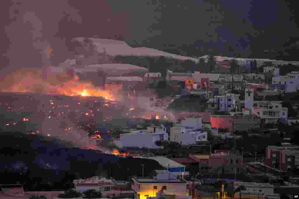 Lava from a volcano destroys houses in the La Laguna neighborhood on the Canary island of La Palma, Spain.