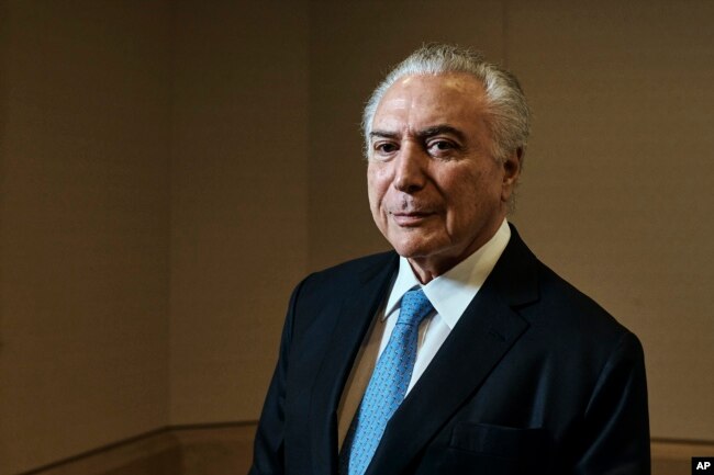 Brazil's President Michel Temer poses for a portrait at Four Seasons Hotel during the 73rd session of the United Nations General Assembly, Sept. 24, 2018, in New York.