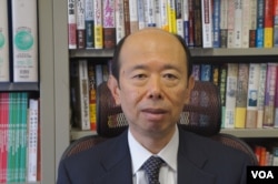 日本亚细亚大学亚洲研究所教授游川和郎相信中国游客大幅增长就会有“后遗症” (美国之音歌篮拍摄)