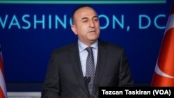Turkish Foreign Minister Mevlut Cavusoglu speaking at a conference at the George Washingon University