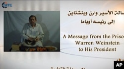 Warren Weinstein saat mengirimkan pesan video kepada Presiden Barack Obama untuk membebaskannya (foto: dok). 