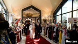Iraqi Prime Minister Mustafa Al-Kadhimi welcomes Pope Francis
