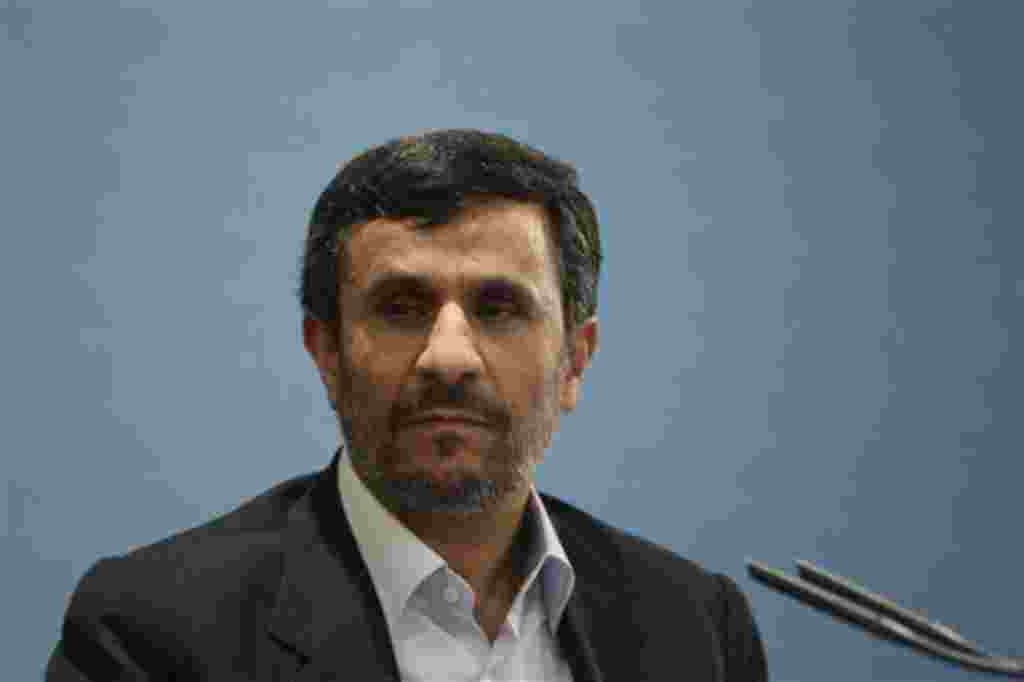 Iranian President Mahmoud Ahmadinejad, gestures, as he speaks with media during his press conference in Tehran, Iran, Monday, April 4, 2011. The president says crude oil prices, now above $108 a barrel, are low, and will reach $150 soon. Oil prices jumped
