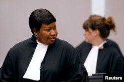 FILE - International Criminal Court Prosecutor Fatou Bensouda (L) is seen at the trial of Congolese warlord Bosco Ntaganda at the ICC in the Hague, the Netherlands, Aug. 28, 2018.