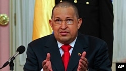 Venezuela's President Hugo Chavez speaks during the swearing in ceremony of two new ministers: Culture and Youth in Caracas, August 1, 2011