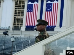 An officer in the military works as a stand-in during the full dress rehearsal of the inauguration (A. Arabasadi/VOA News)