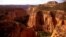 FILE - In this undated file photo, the Upper Gulch section of the Escalante Canyons within Utah's Grand Staircase-Escalante National Monument features sheer sandstone walls, broken occasionally by tributary canyons.