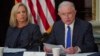 Homeland Security Secretary Kirstjen Nielsen, left, listens as Attorney General Jeff Sessions, right, speaks during a meeting in Washington, Aug. 16, 2018.