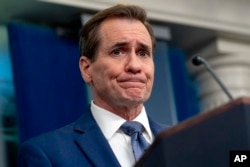 FILE — White House national security communications adviser John Kirby takes a question from a reporter during a press briefing at the White House in Washington, March 1, 2024.