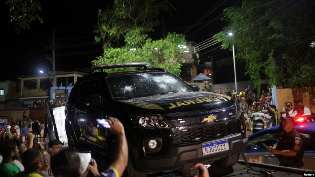 View of a federal police vehicle damaged after Brazilian politician Roberto Jefferson fired at police while resisting arrest ordered by the country's Supreme Court, in Comendador Levy Gasparian