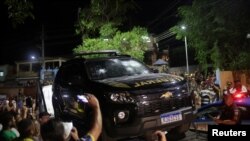 View of a federal police vehicle damaged after Brazilian politician Roberto Jefferson fired at police while resisting arrest ordered by the country's Supreme Court, in Comendador Levy Gasparian