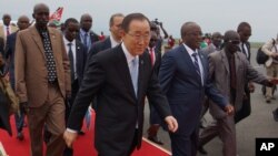 UN Secretary-General Ban Ki-moon, center, walks surrounded by Burundian Security personnel as he arrives in Bujumbura, Burundi, Monday, Feb.22, 2016.