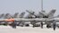 FILE - Dozens of Turkish F-16 jets prepare to take off during Anatolian Eagle exercise at 3rd Main Jet Air Base near the central Anatolian city of Konya.