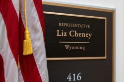 A sign bearing the name of Rep. Liz Cheney, R-Wyo., outside of her office on Capitol Hill in Washington, May 11, 2021.