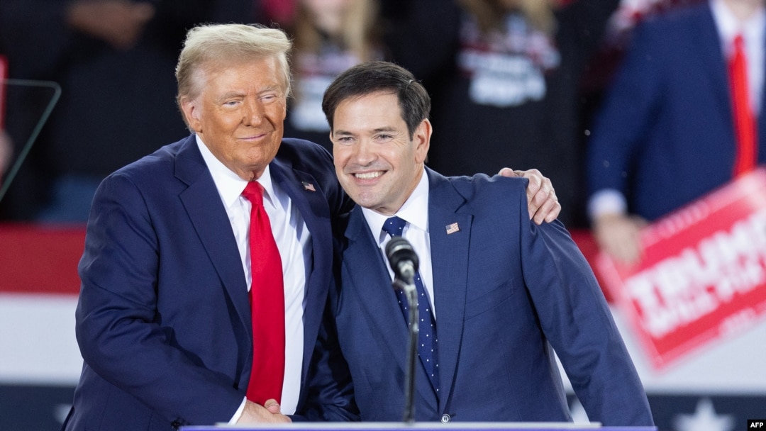 FILE - Former U.S. President Donald Trump greets Senator Marco Rubio, a Republican from Florida, during a campaign rally in Raleigh, North Carolina, on Nov. 4, 2024. Trump announced on Nov. 13, 2024, that he would nominate Rubio to serve as secretary of state.