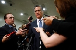 Sen. Mitt Romney, R-Utah, speaks to reporters after a classified members-only briefing on Iran, May 21, 2019, on Capitol Hill in Washington.