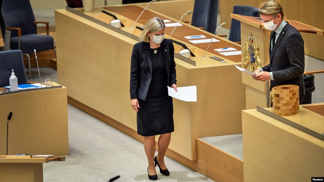 Swedish Prime Minister Magdalena Andersson and Green Party spokesperson Per Bolund take part in a parliamentary debate in Swedish parliament Riksdagen, in Stockholm, Sweden, Jan. 12, 2022. 