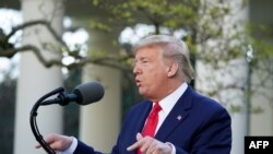 President Donald Trump speaks during the daily briefing on the novel coronavirus in the Rose Garden of the White House in Washington, March 30, 2020.