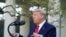 President Donald Trump speaks during the daily briefing on the novel coronavirus in the Rose Garden of the White House in Washington, March 30, 2020.