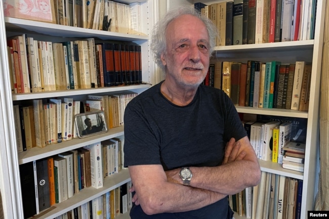 Scientist Pierre Agostini poses during an interview with Reuters after winning the 2023 Nobel Prize in Physics in Paris, France, October 3, 2023. (REUTERS/Clotaire Achi)