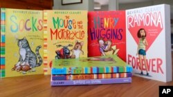 This image shows a collection of books by Beverly Cleary on March 26, 2021, The beloved children's author, whose characters Ramona Quimby and Henry Huggins enthralled generations of youngsters, has died. She was 104.