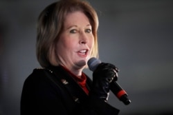 FILE - Attorney Sidney Powell, a member of President Donald Trump's legal team, speaks during a rally on Dec. 2, 2020, in Alpharetta, Ga.