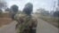 Des extraits de la vidéo qui montre des militaires tués une femme nue, le 14 septembre 2020. (Reuters)