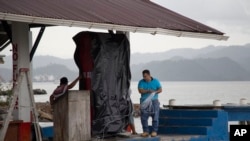 A marine gas station is shut down as it prepares for the arrival of Hurricane Earl, in Puerto Barrios, Guatemala, Aug. 3, 2016. 