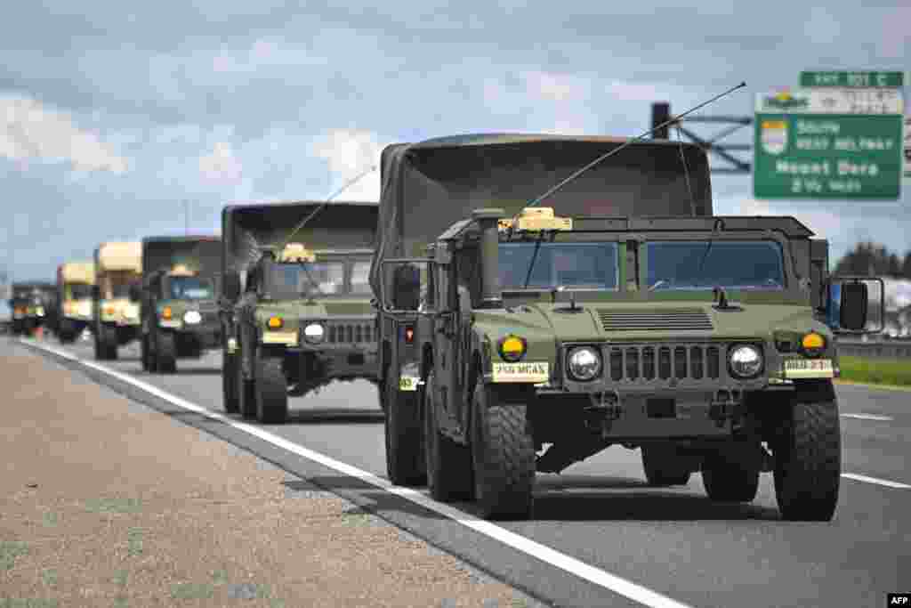 A military convoy is seen ahead of Hurricane Milton&#39;s expected mid-week landfall in Sanford, Florida, Oct. 8, 2024.&nbsp;