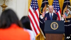 President Joe Biden speaks during a news conference in the East Room of the White House, March 25, 2021, in Washington.