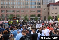 FILE - Protesters gather in the Public Square in downtown Cleveland, where the Republican National Convention is being held, July 18, 2016.