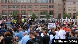 Protesters gather in the Public Square in downtown Cleveland, where the Republican National Convention is being held, July 18, 2016. Presumptive presidential nominee Donald Trump will give a speech Thursday, the final night of the convention.