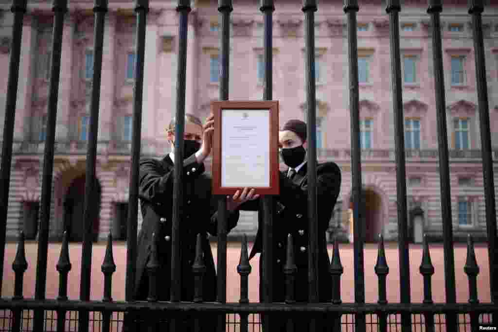 An announcement is attached to the fence of Buckingham Palace stating that Britain's Prince Philip, husband of Queen Elizabeth, has died at the age of 99, in London, Britain.