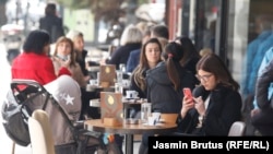 Bosnia and Herzegovina -- Authorities of Sarajevo Canton eased COVID measures, people enjoying drinking coffee in restaurant and cafes (coronavirus, COVID-19, pandemic), in Sarajevo, April 12, 2021.