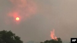 Photo shows the Encino Fire in Sonoita, Arizonia, June 20, 2017. An extreme heat wave in the western U.S. has made the fight against a series of wildfires more difficult.