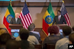 US Secretary of State Rex Tillerson, left, addresses the media after his meeting with Ethiopian Foreign Minister Dr. Workneh Gebeyehu at a joint press conference in Addis Ababa, Ethiopia, March 8, 2018.