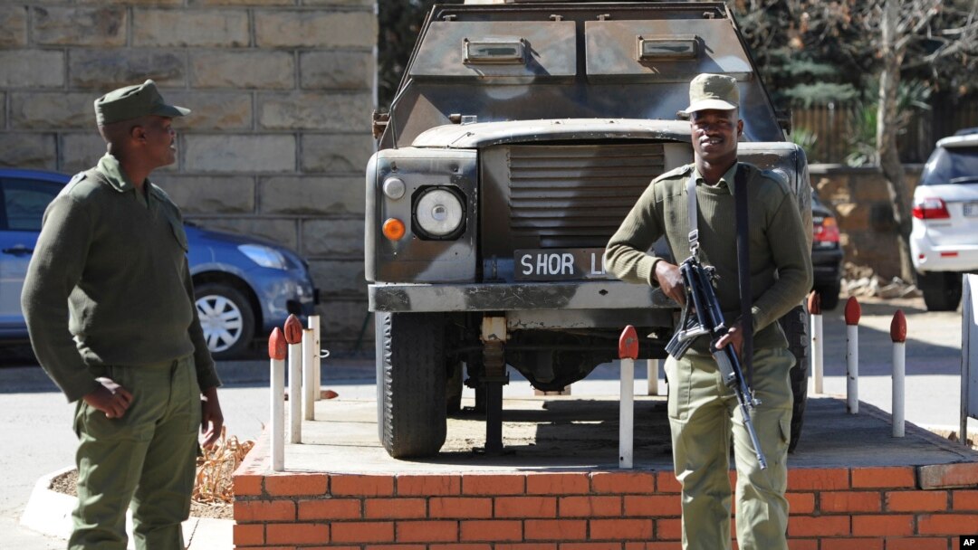 Army personnel man outside the military headquarters in Maseru, Lesotho, Aug. 31, 2014.