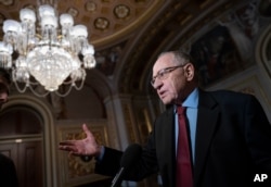 FILE - Attorney Alan Dershowitz speaks to reporters at the Capitol in Washington, Jan. 29, 2020.