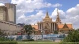 Workers destruct the wall of Phnom Penh's Buddhist Institute as part of an expansion of the nearby Naga World casino. (Video screenshot from Sam Rainsy Facebook page)