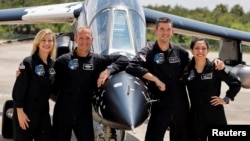 Anna Menon, Scott Poteet, Jared Isaacman and Sarah Gillis, crew members of Polaris Dawn, a private human spaceflight mission, attend a press conference at the Kennedy Space Center in Cape Canaveral, Florida, U.S. August 19, 2024. (REUTERS/Joe Skipper)