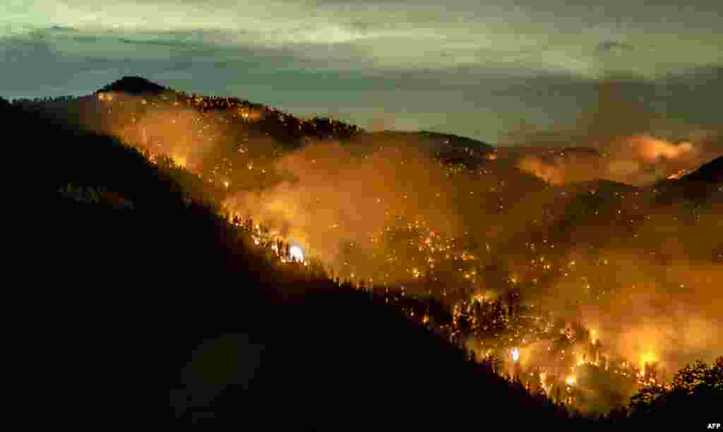 The Bobcat Fire continues to burn through the Angeles National Forest in Los Angeles County, north of Azusa, California, Sept. 17, 2020.