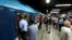 FILE - People wait to board a train at Al Shohadaa metro station in Cairo, Egypt, July 24, 2017. 