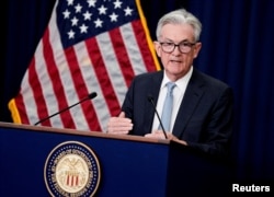 FILE PHOTO: Federal Reserve Board Chair Jerome Powell speaks about the U.S. economy and Fed interest rate plans during news conference following Federal Open Market Committee (FOMC) meeting in Washington