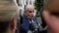 FILE - President Donald Trump's lawyer, Rudy Giuliani, speaks to reporters on the South Lawn of the White House in Washington, May 30, 2018.
