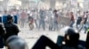 Four Killed as Riot Police Fire on Demonstrators